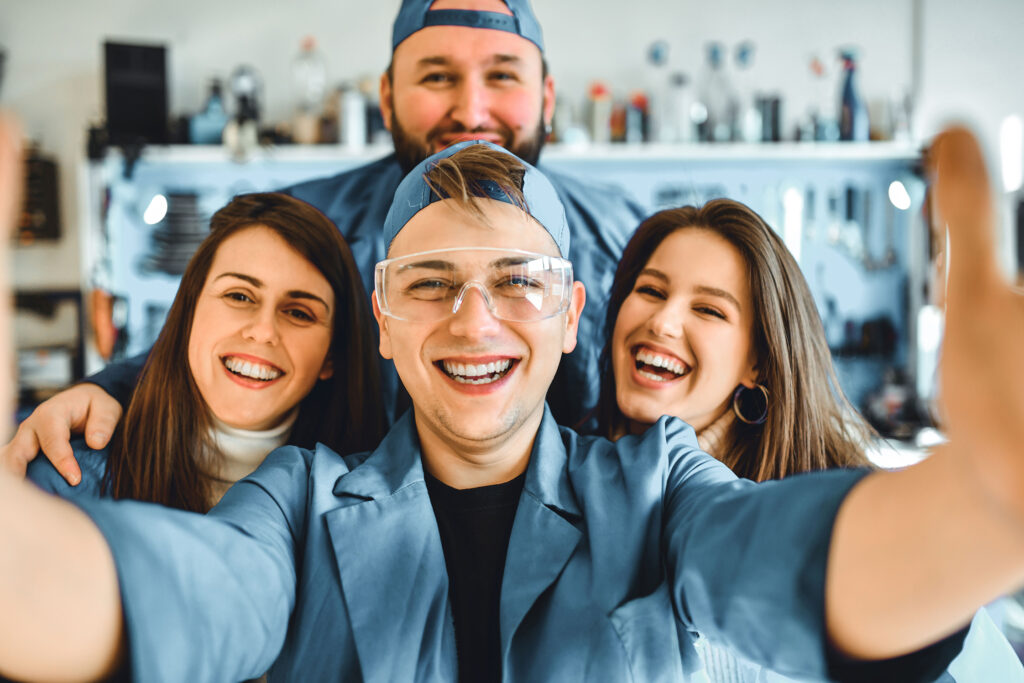 Smiling Mechanics Selfie In Workshop iStock 1264258176